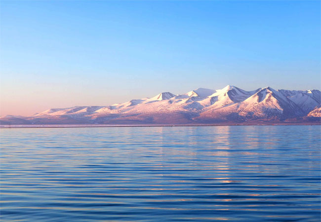 Pristine Kailash Sarovar Lake Surrounded by Snow-Capped Peaks