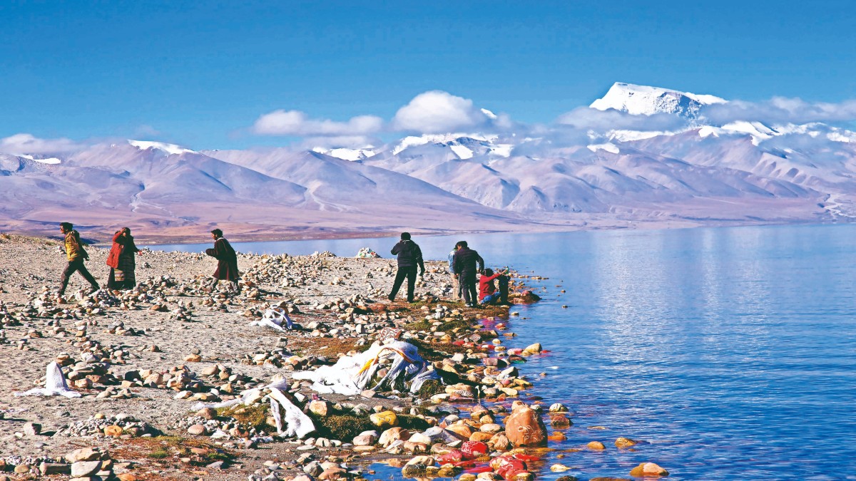 Pilgrims Taking Holy Bath at Sacred Mansarovar Lake